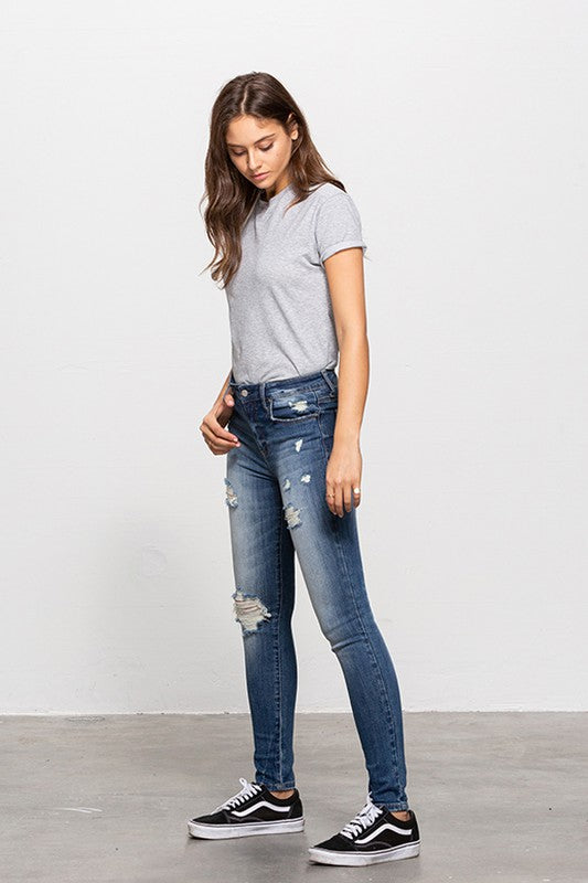 MID-RISE PREMIUM BODY DISTRESSED ANKLE SKINNY