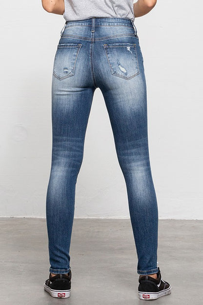 MID-RISE PREMIUM BODY DISTRESSED ANKLE SKINNY