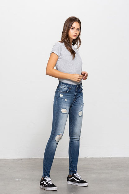MID-RISE PREMIUM BODY DISTRESSED ANKLE SKINNY